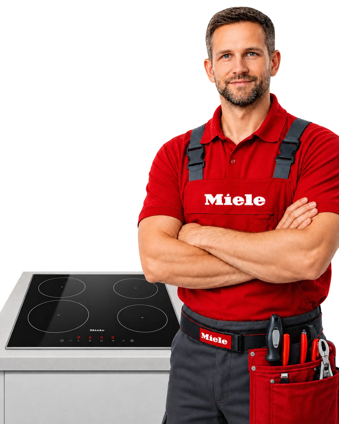 Мастер в красной форме рядом с индукционной варочной панелью Miele