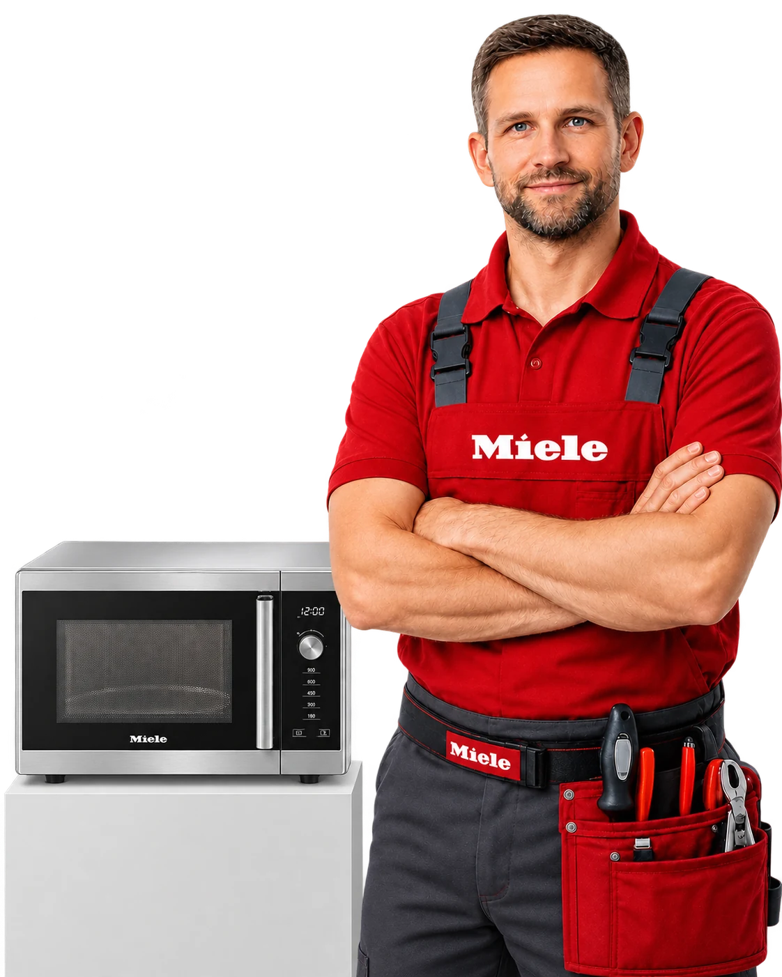 Мастер в красной форме рядом с микроволновой печью Miele